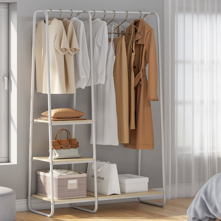 Portable closet outlet hanging rack